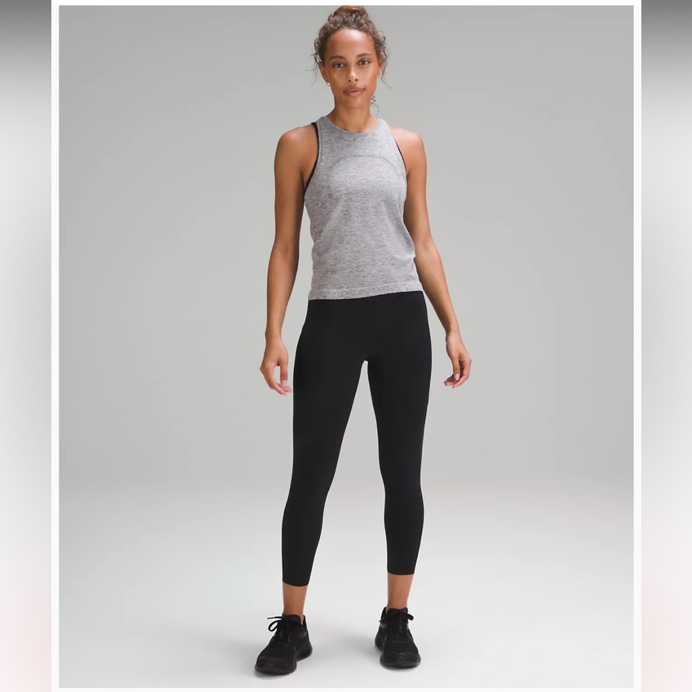 592. Lululemon athletica fast and free HR tight 25” black nwt size 6